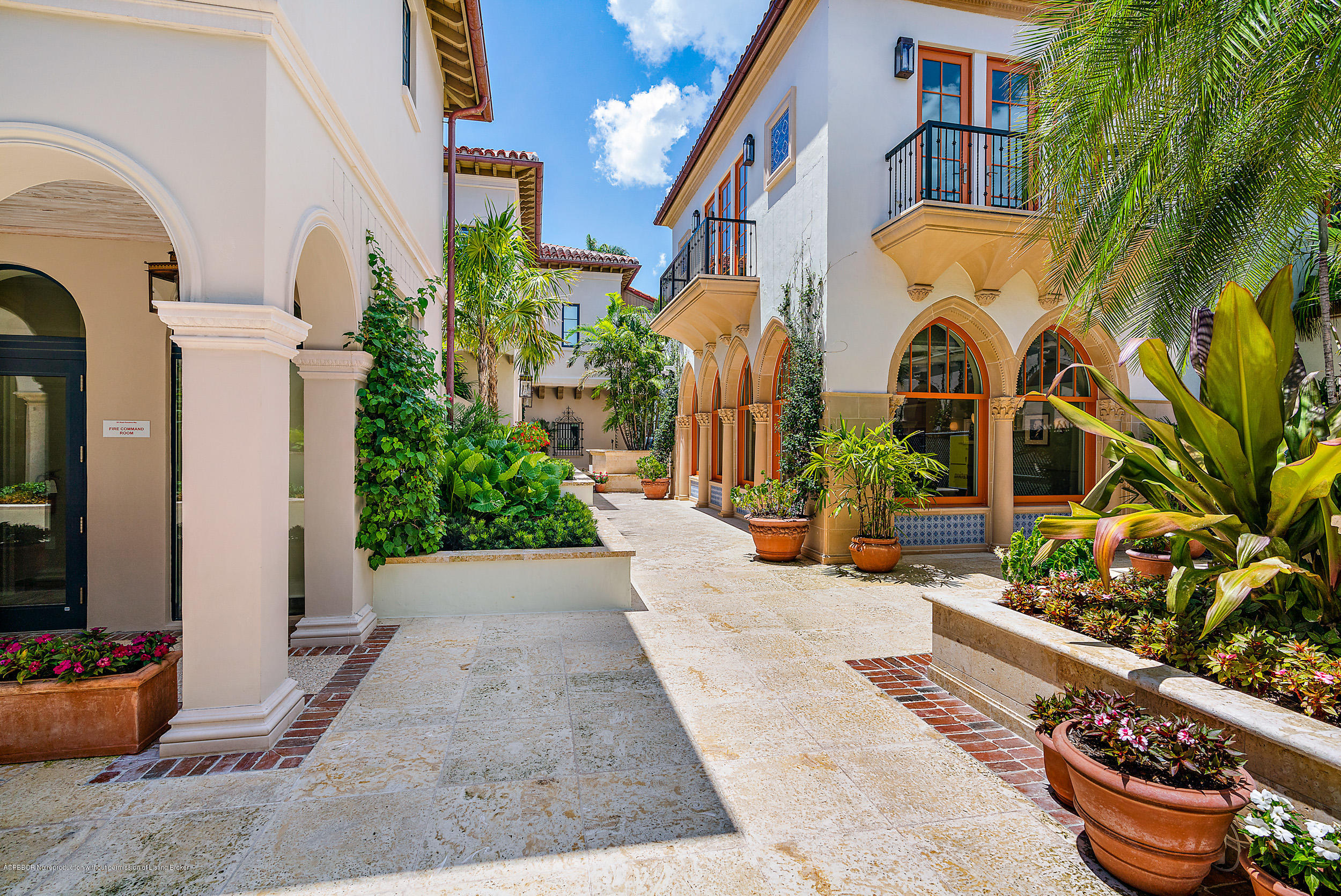 3 Via Flagler Palm Beach, FL 33480 - Photo 2 of 42 a view of a building with potted plants