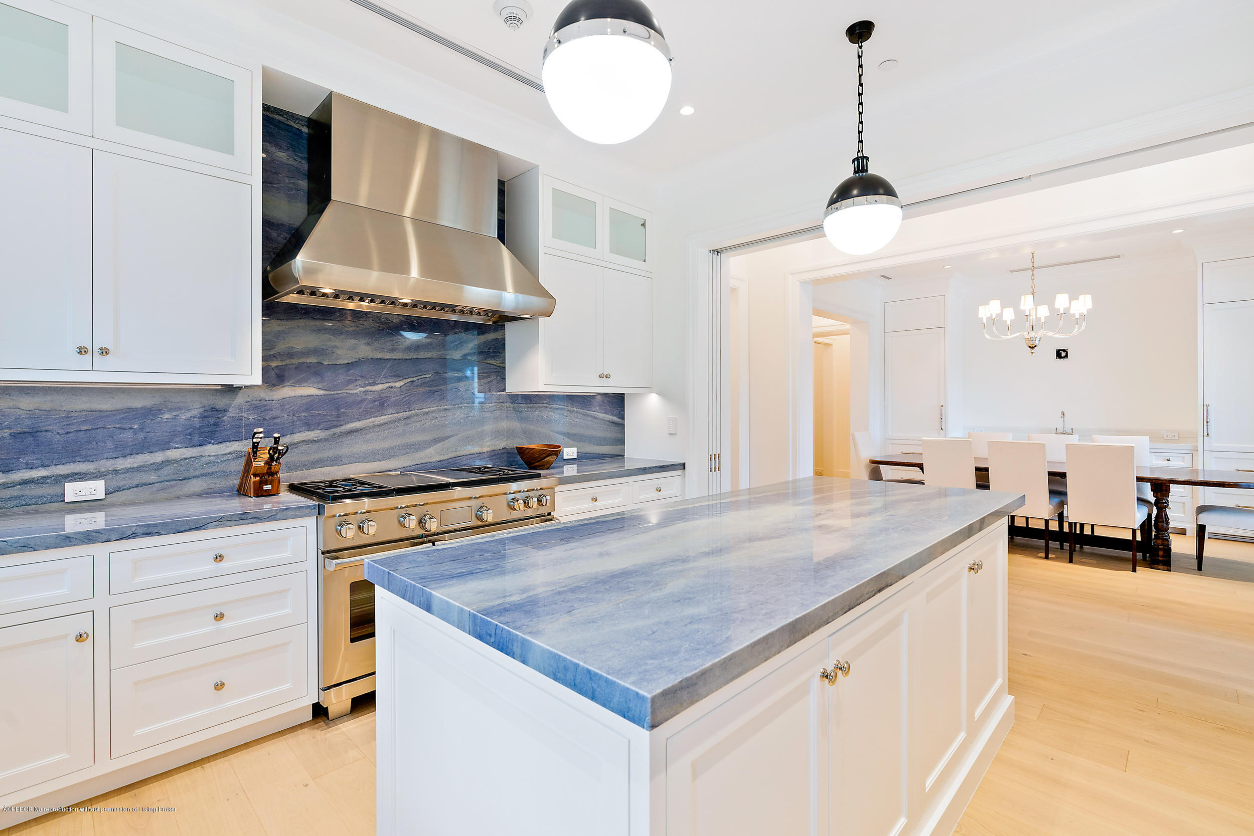 3 Via Flagler Palm Beach, FL 33480 - Photo 16 of 42 a kitchen with a stove and a sink