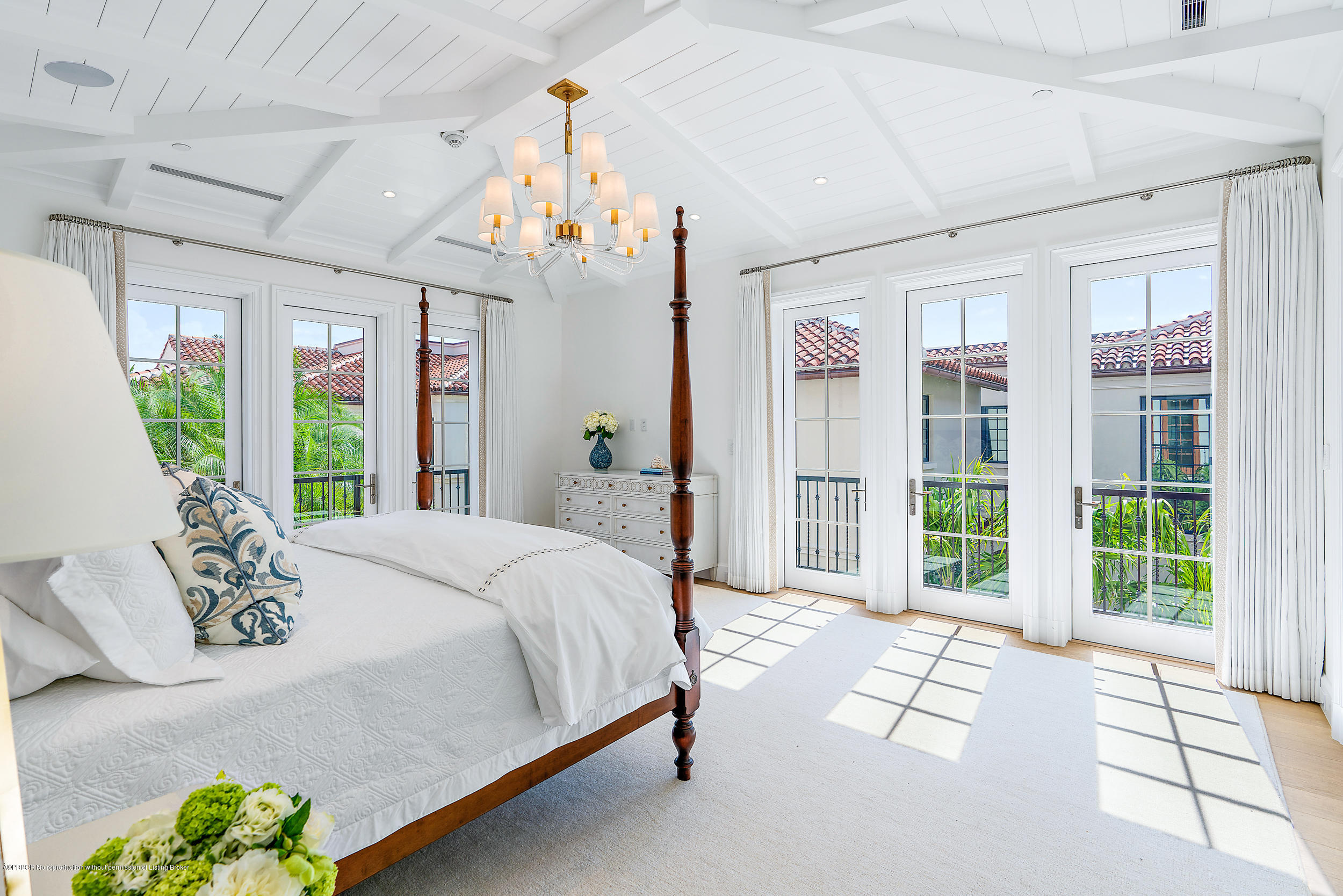 3 Via Flagler Palm Beach, FL 33480 - Photo 23 of 42 a bed sitting in a bedroom next to a window