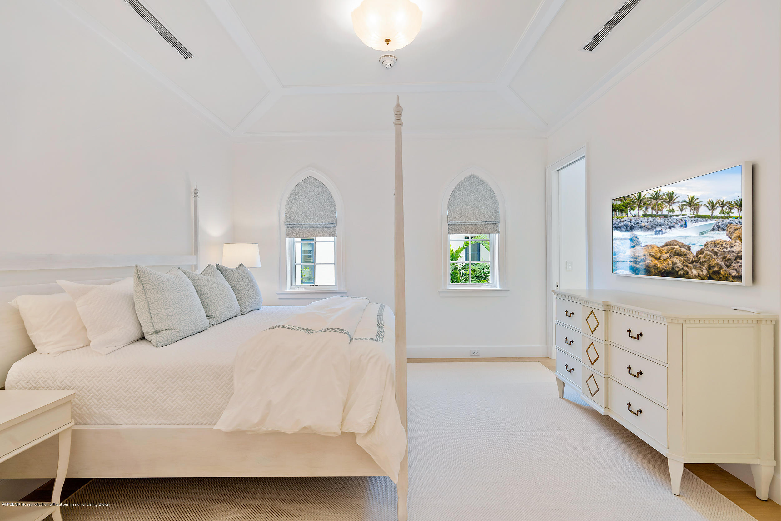 3 Via Flagler Palm Beach, FL 33480 - Photo 30 of 42 a bedroom with a bed and a dresser