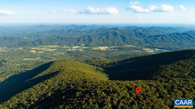 a view of a roof deck with wooden floor and fence