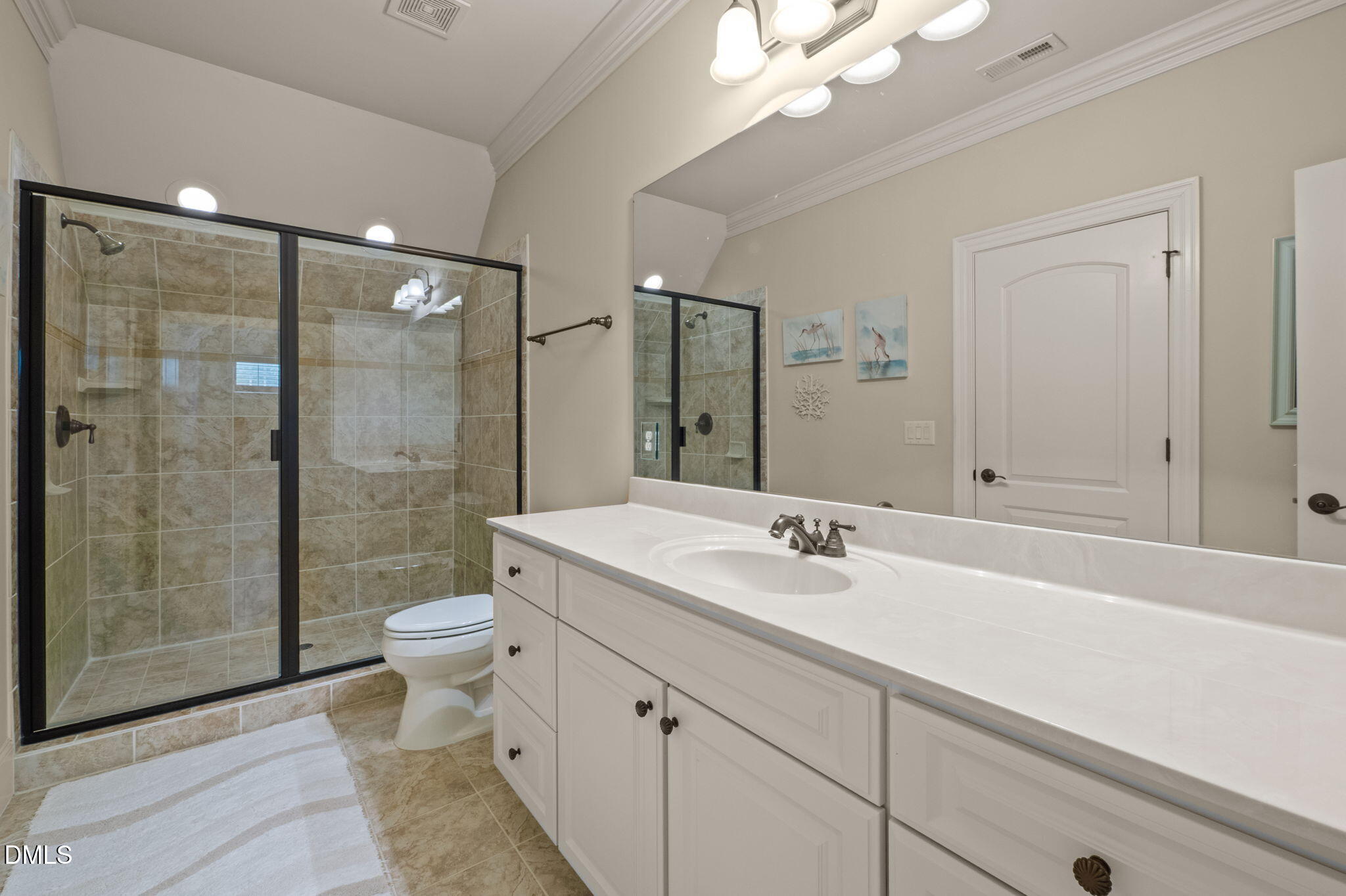 4171 English Garden Way Raleigh, NC 27612 - Photo 25 of 39 a bathroom with a sink a toilet and shower