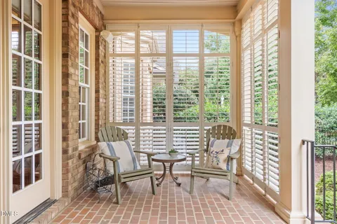 a view of a living room and dining room