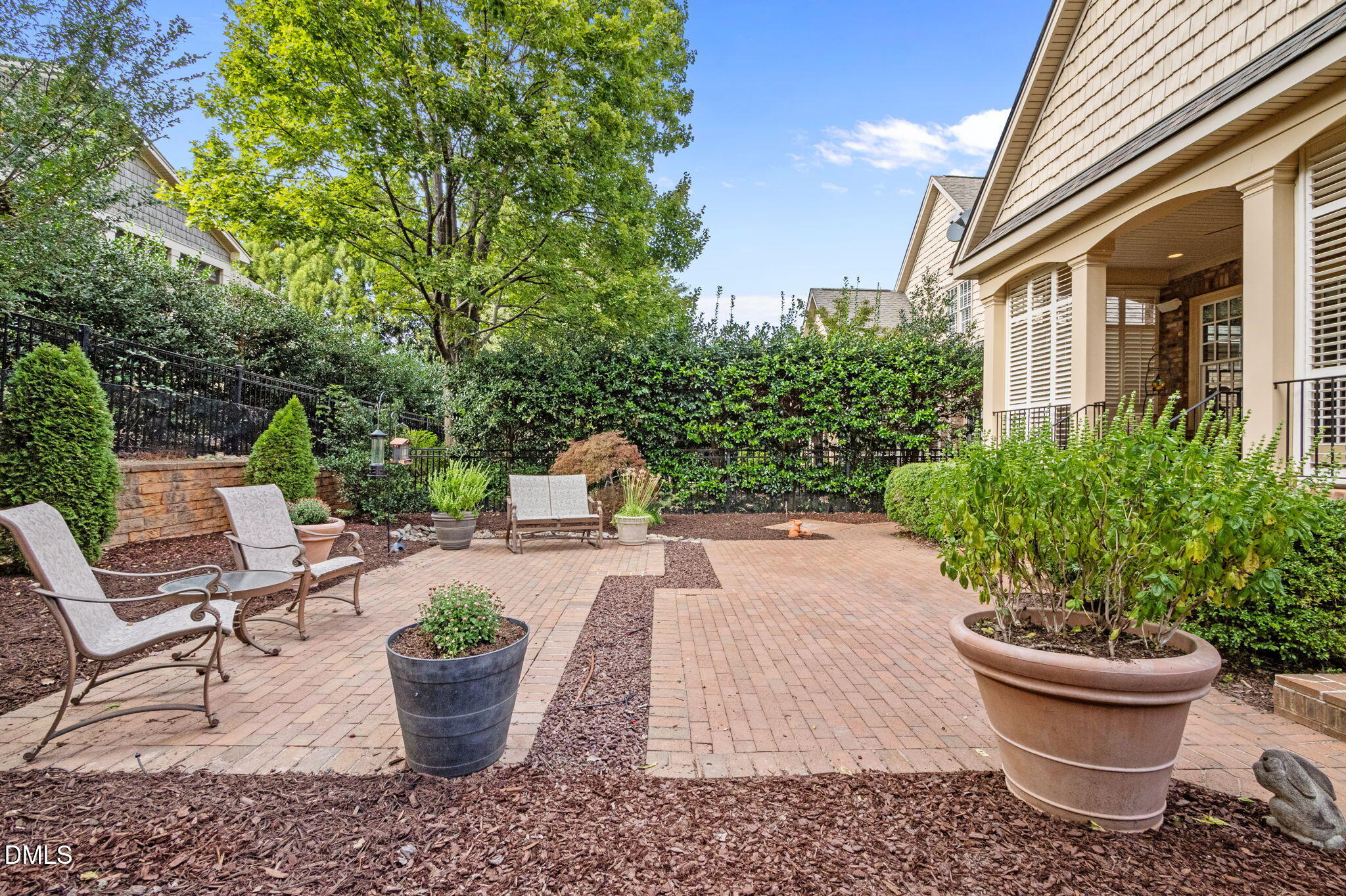 4171 English Garden Way Raleigh, NC 27612 - Photo 32 of 39 a view of a backyard with garden and patio