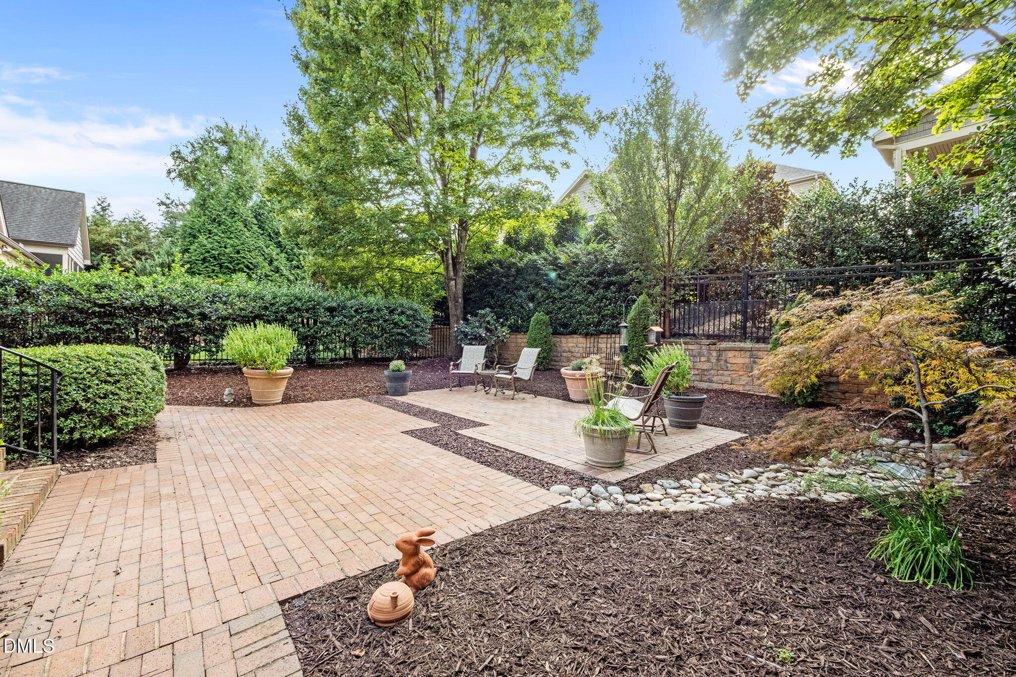 4171 English Garden Way Raleigh, NC 27612 - Photo 33 of 39 a view of a backyard with sitting area