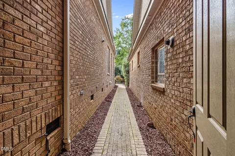 a view of a pathway both side of building