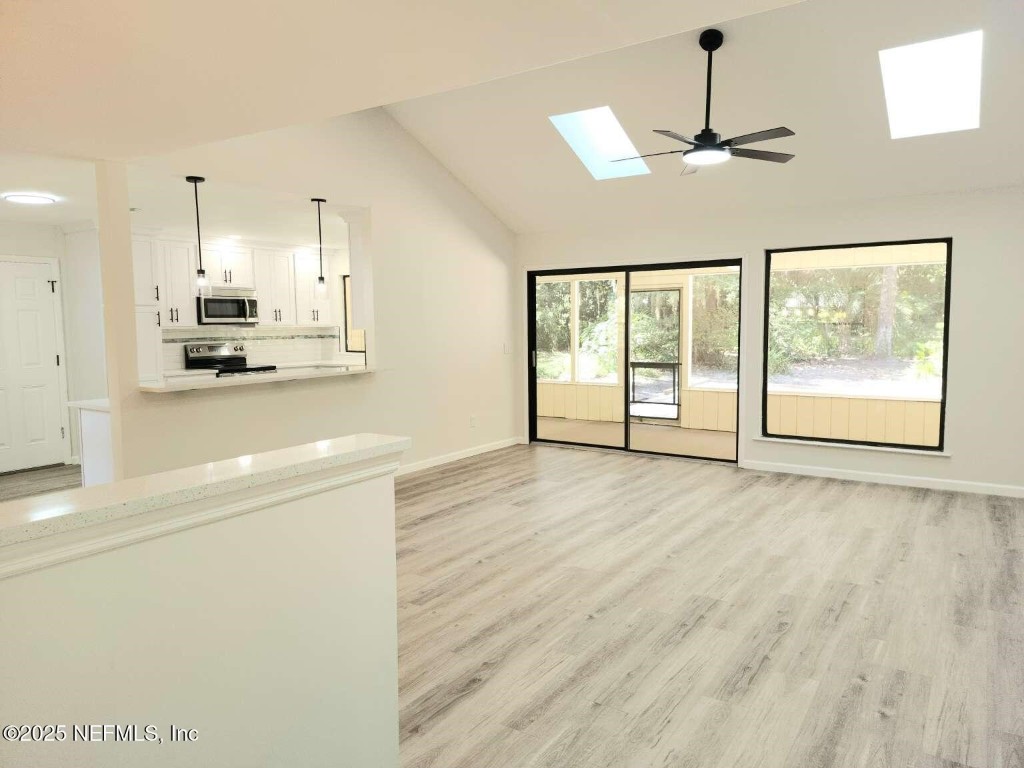 1347 Autumn Trace Fernandina Beach, FL 32034 - Photo 2 of 20 a view of an empty room with a window