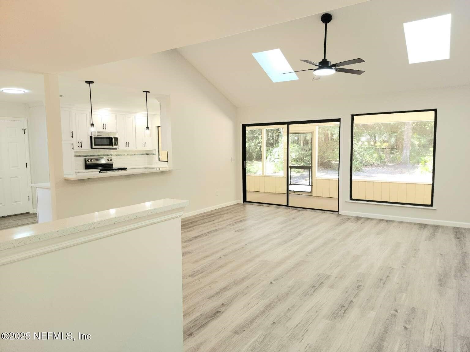 1347 Autumn Trace Fernandina Beach, FL 32034 - Photo 2 of 20 a view of an empty room with a window