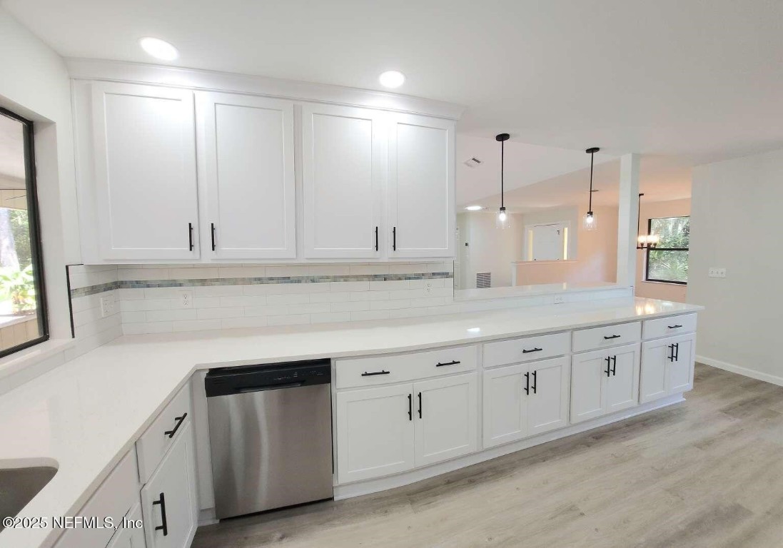 1347 Autumn Trace Fernandina Beach, FL 32034 - Photo 5 of 20 a spacious bathroom with double sink and a mirror