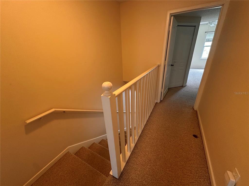709 Bloom Street, Unit 240 Celebration, FL 34747 - Photo 6 of 17 a view of a room with staircase