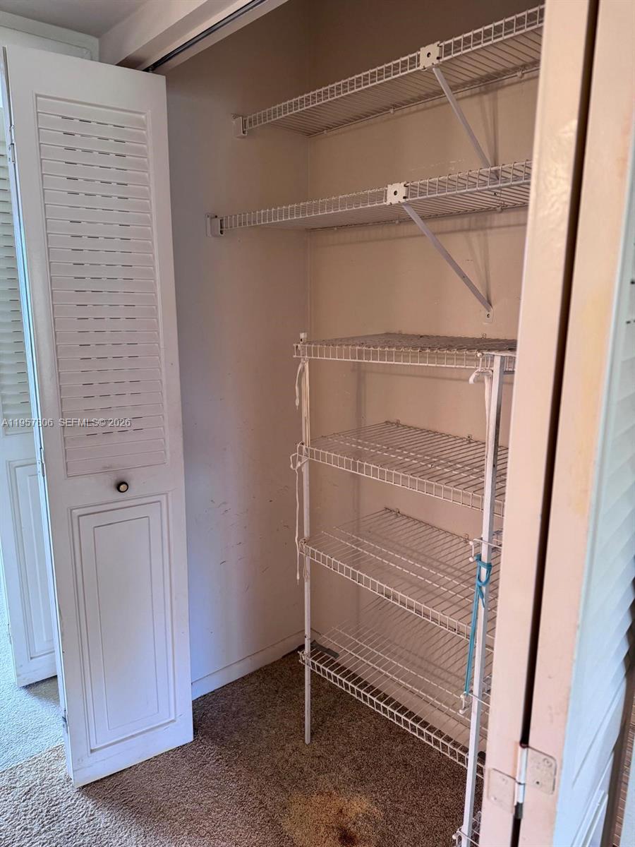 272 Dorset East, Unit G Boca Raton, FL 33434 - Photo 4 of 10 a view of an empty room