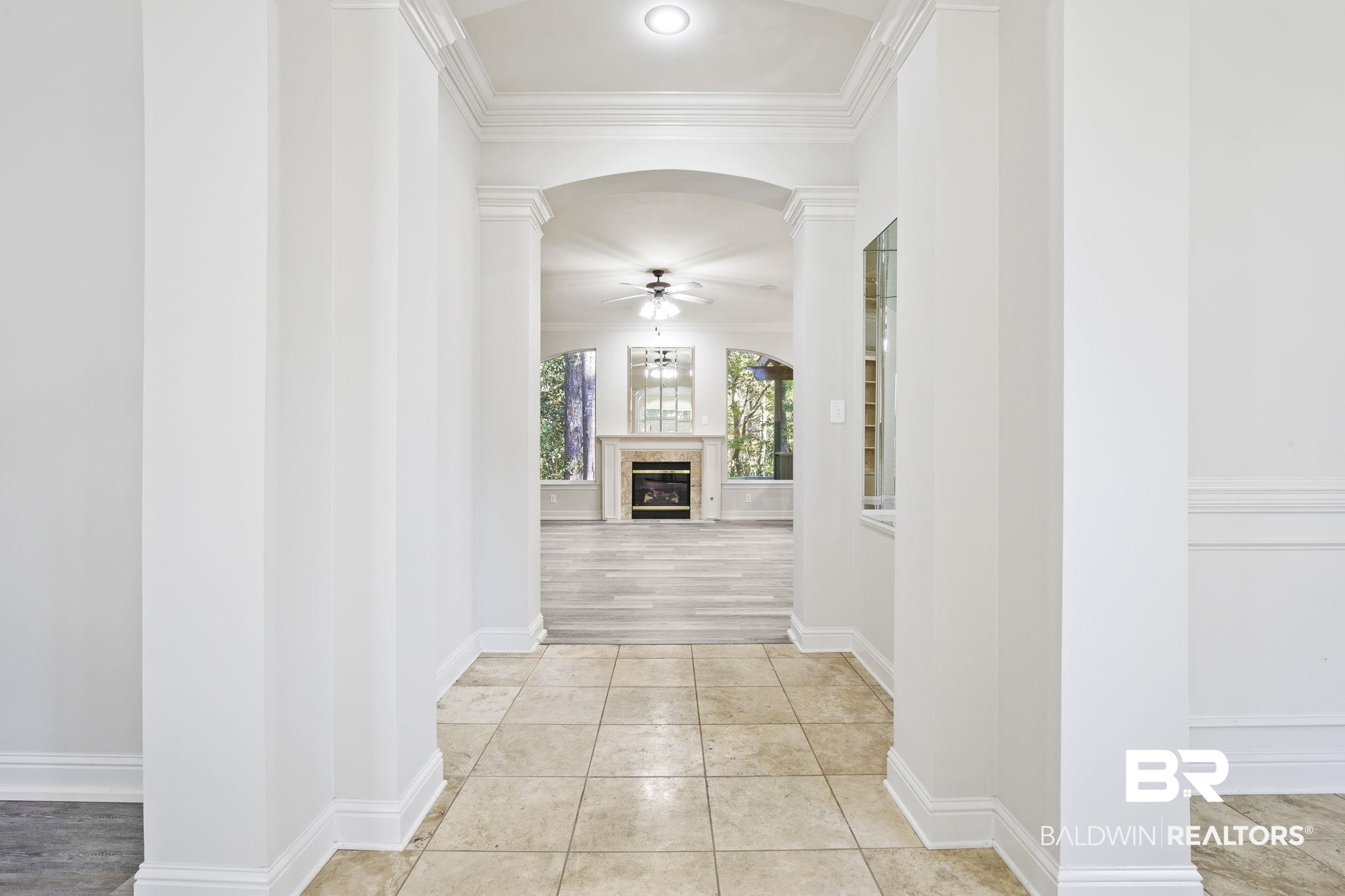 13 Bugle Retreat Daphne, AL 36527 - Photo 4 of 40 Hall featuring light hardwood / wood-style flooring, ornate columns, and ornamental molding