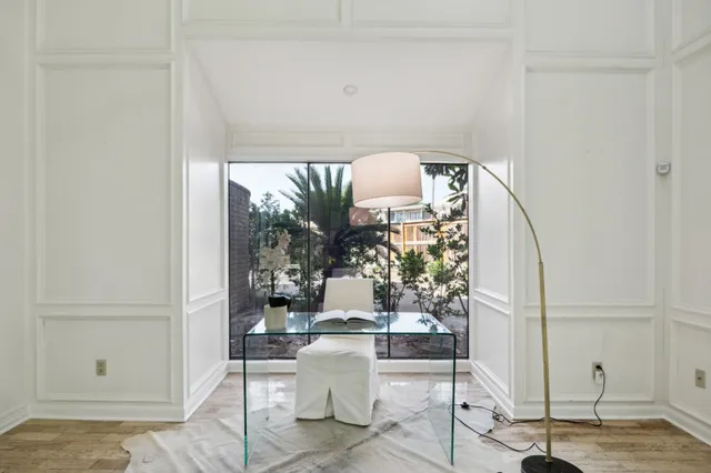 a room with table and chairs