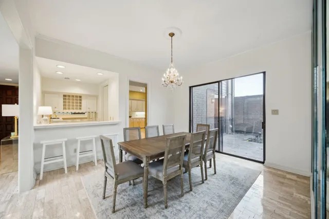 a view of a dining room with furniture and window