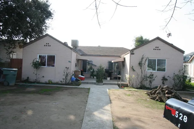 a front view of a house with patio