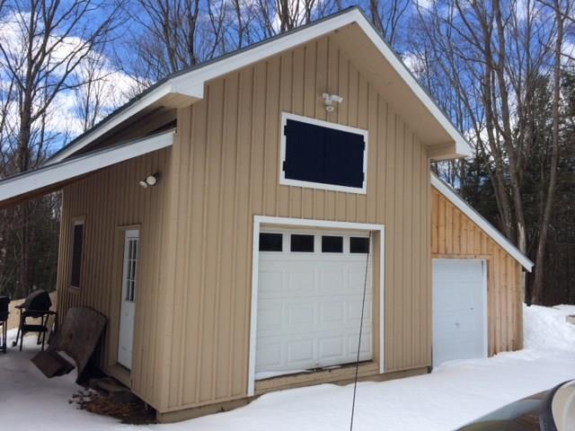 182 Peter Vier Road Durham, ME 04222 - Photo 18 of 19 The garage and eave storage. Room...