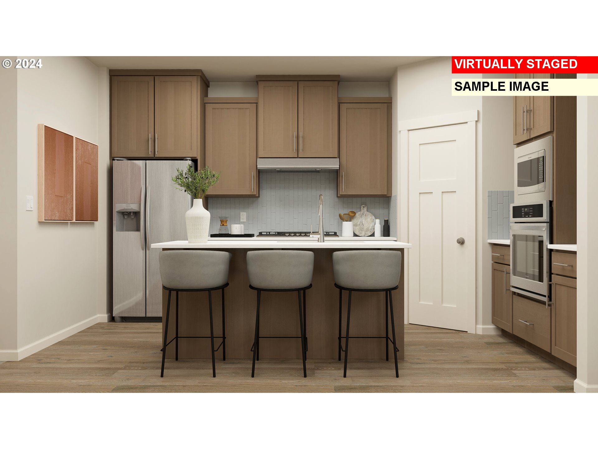 12134 Southwest Champlin Lane Beaverton, OR 97007 - Photo 5 of 24 a kitchen with stainless steel appliances a sink and a refrigerator