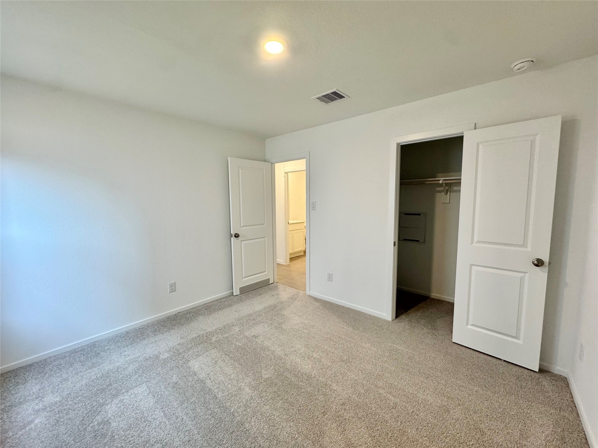 14885 North Ascot Bnd Circle Conroe, TX 77306 - Photo 12 of 14 an empty room with closet area