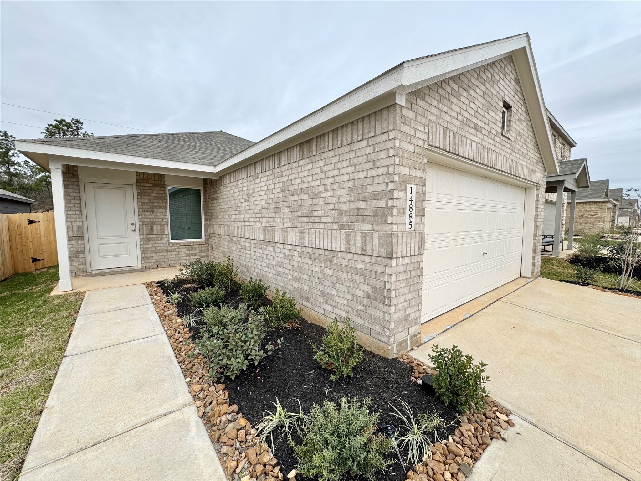 14885 North Ascot Bnd Circle Conroe, TX 77306 - Photo 2 of 14 a front view of a house with garage