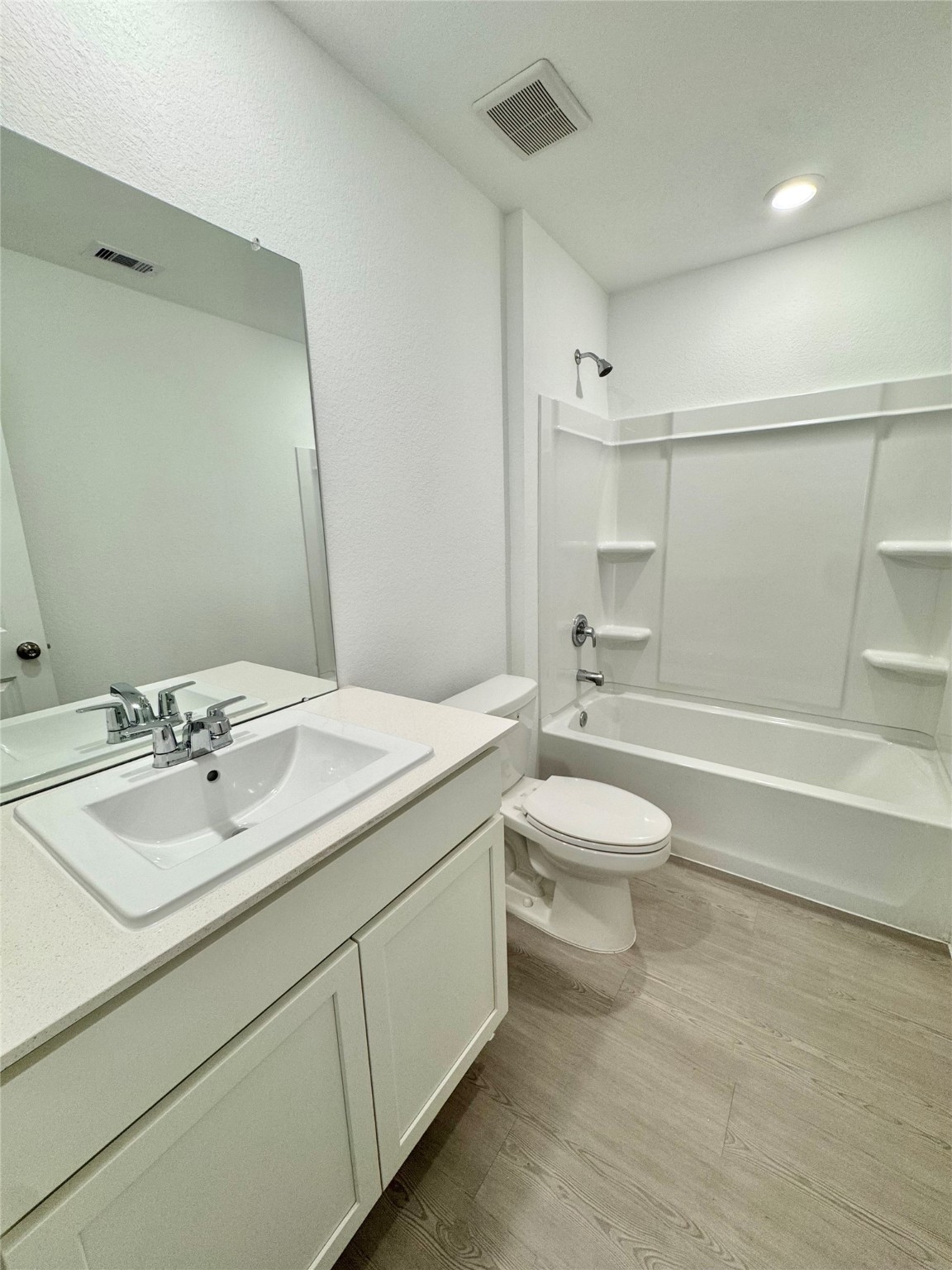 14885 North Ascot Bnd Circle Conroe, TX 77306 - Photo 10 of 14 a bathroom with a sink a toilet and shower