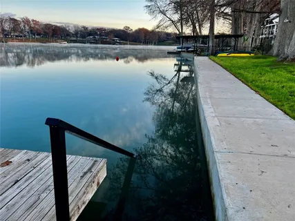 a view of a lake from a balcony