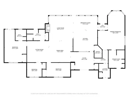a front view of a house with a yard table and chairs