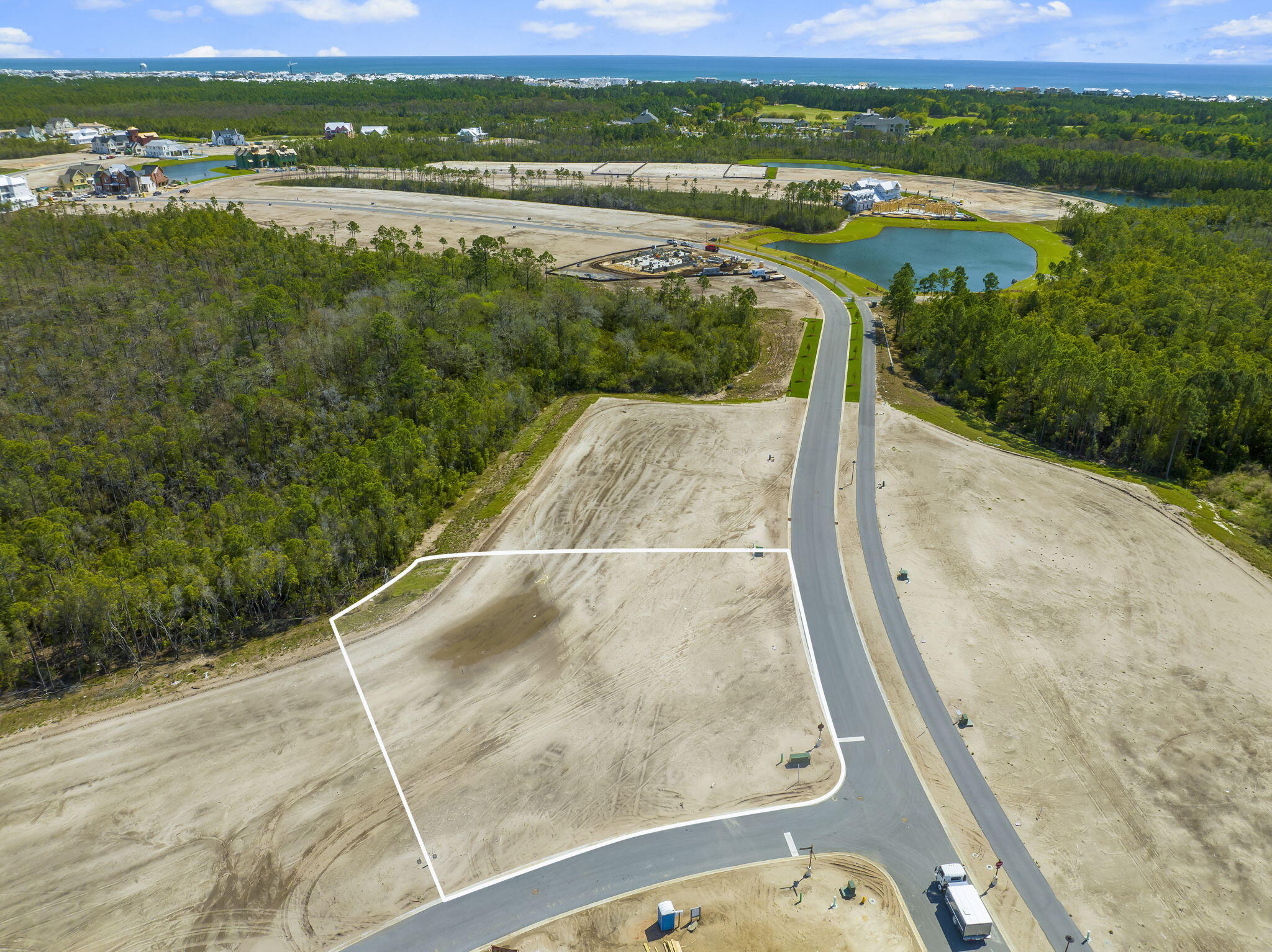 182 Windsong Dr Inlet Beach Inlet Beach, FL 32461 - Photo 5 of 12 a view of a lake with a mountain