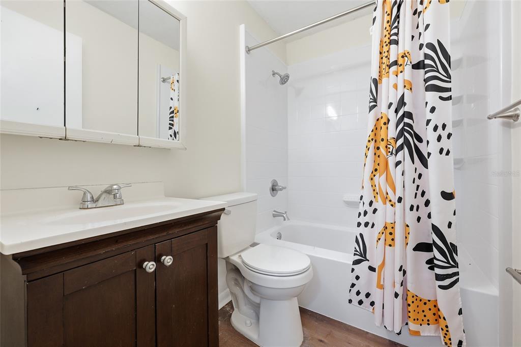 2735 Southwest 35th Place, Unit 306 Gainesville, FL 32608 - Photo 11 of 17 a bathroom with a sink and a toilet