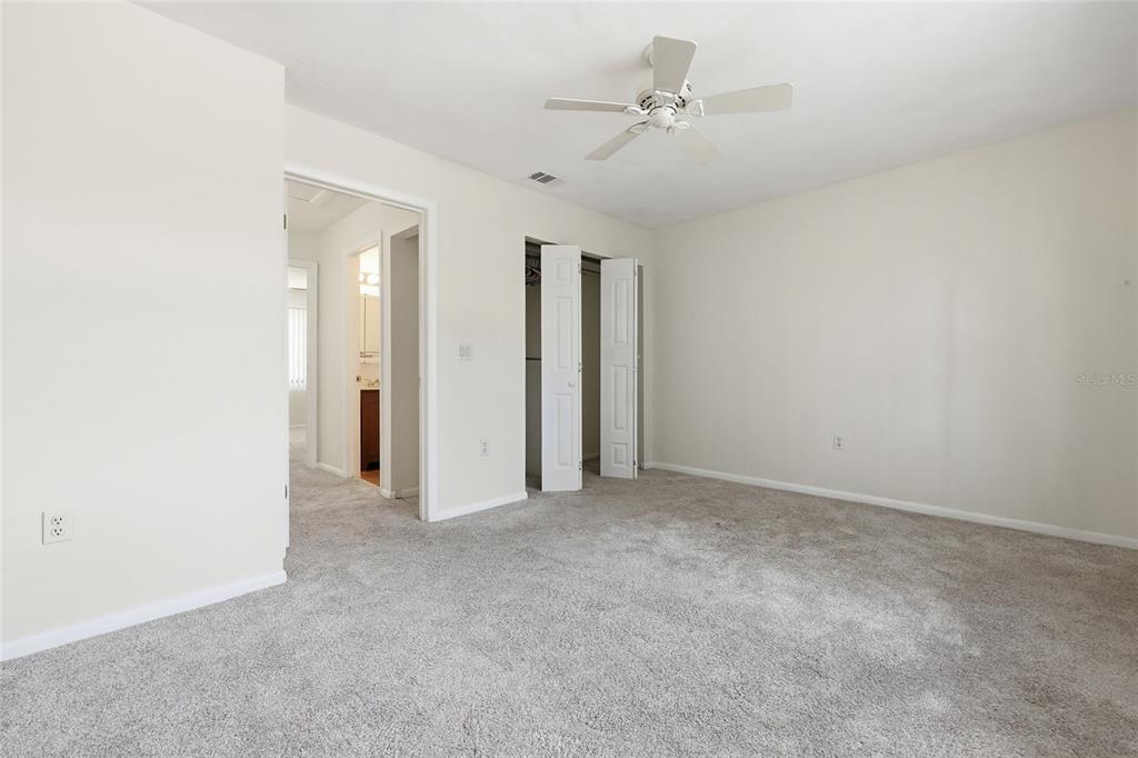 2735 Southwest 35th Place, Unit 306 Gainesville, FL 32608 - Photo 13 of 17 an empty room with a bathroom