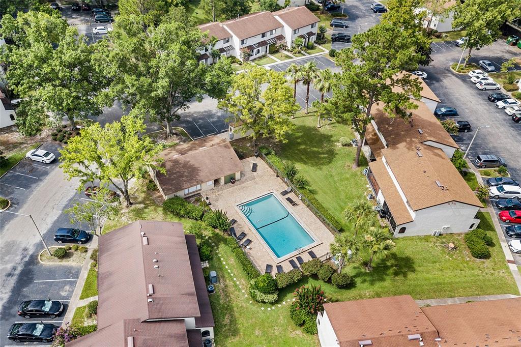 2735 Southwest 35th Place, Unit 306 Gainesville, FL 32608 - Photo 16 of 17 an aerial view of a house with a yard