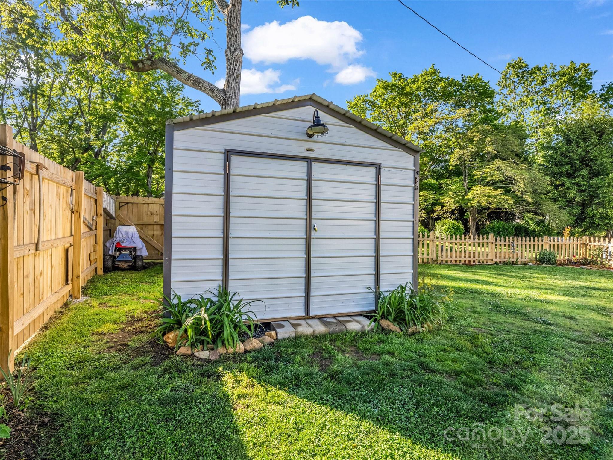 566 Blue Ridge Road Black Mountain, NC 28711 - Photo 14 of 41 a view of a house with a yard
