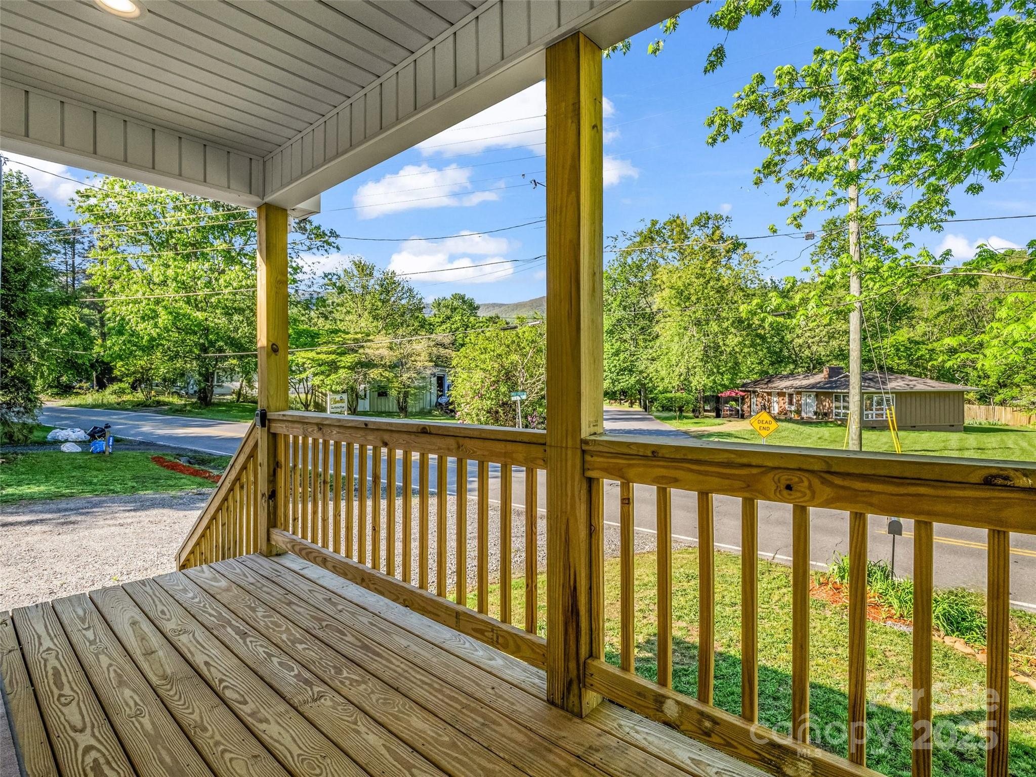 566 Blue Ridge Road Black Mountain, NC 28711 - Photo 15 of 41 a view of balcony with wooden floor