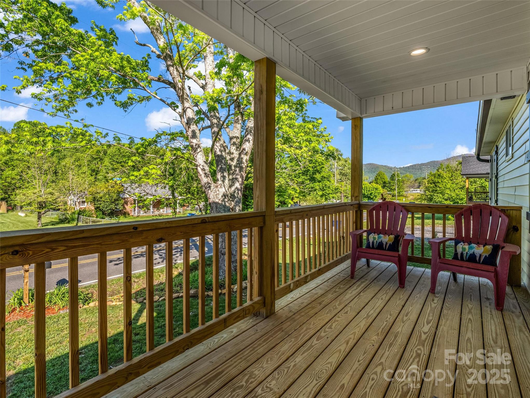566 Blue Ridge Road Black Mountain, NC 28711 - Photo 17 of 41 a view of a two chairs in the balcony
