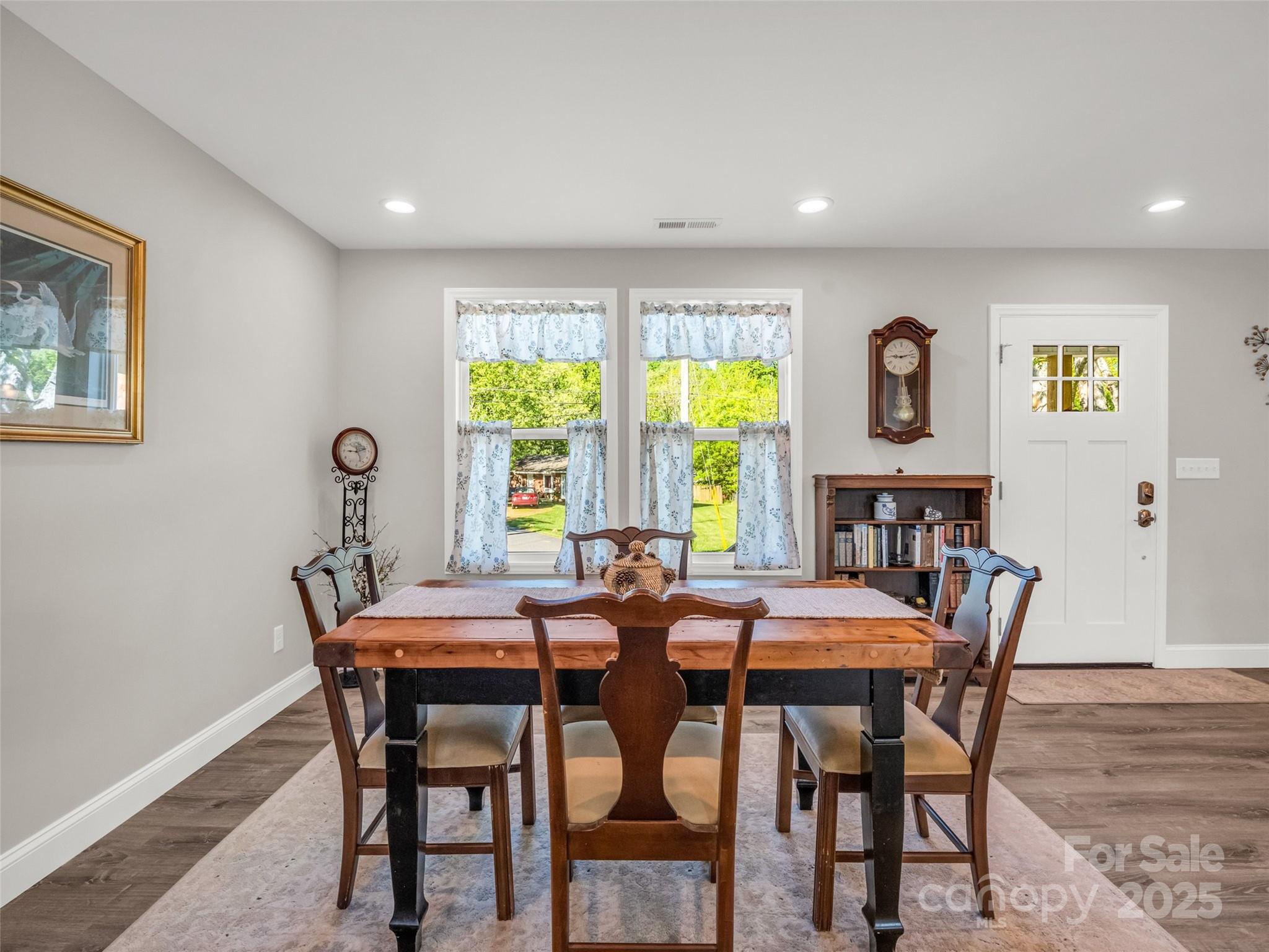 566 Blue Ridge Road Black Mountain, NC 28711 - Photo 21 of 41 a view of a dining room with furniture and window