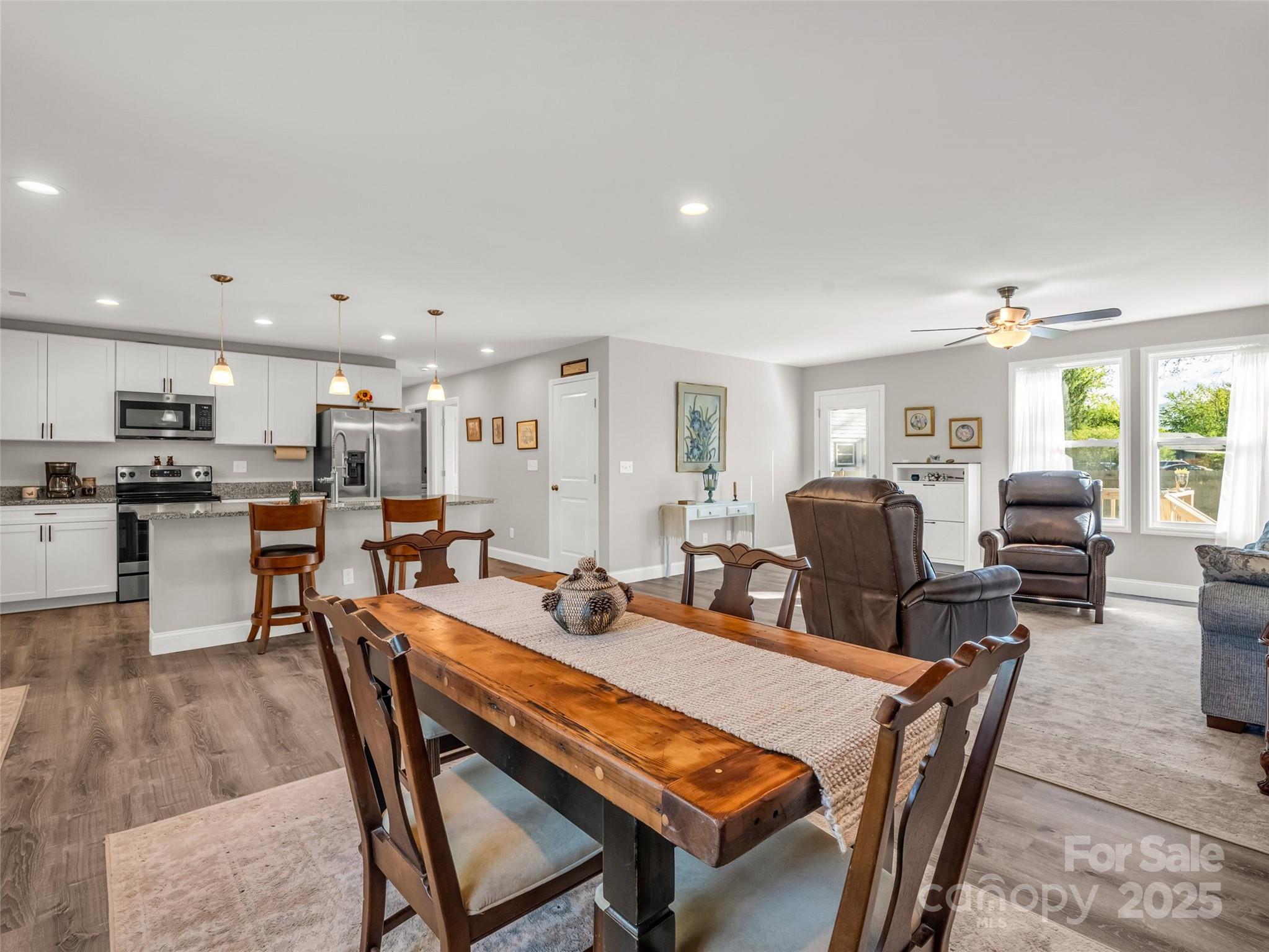 566 Blue Ridge Road Black Mountain, NC 28711 - Photo 22 of 41 a view of a dining room with furniture
