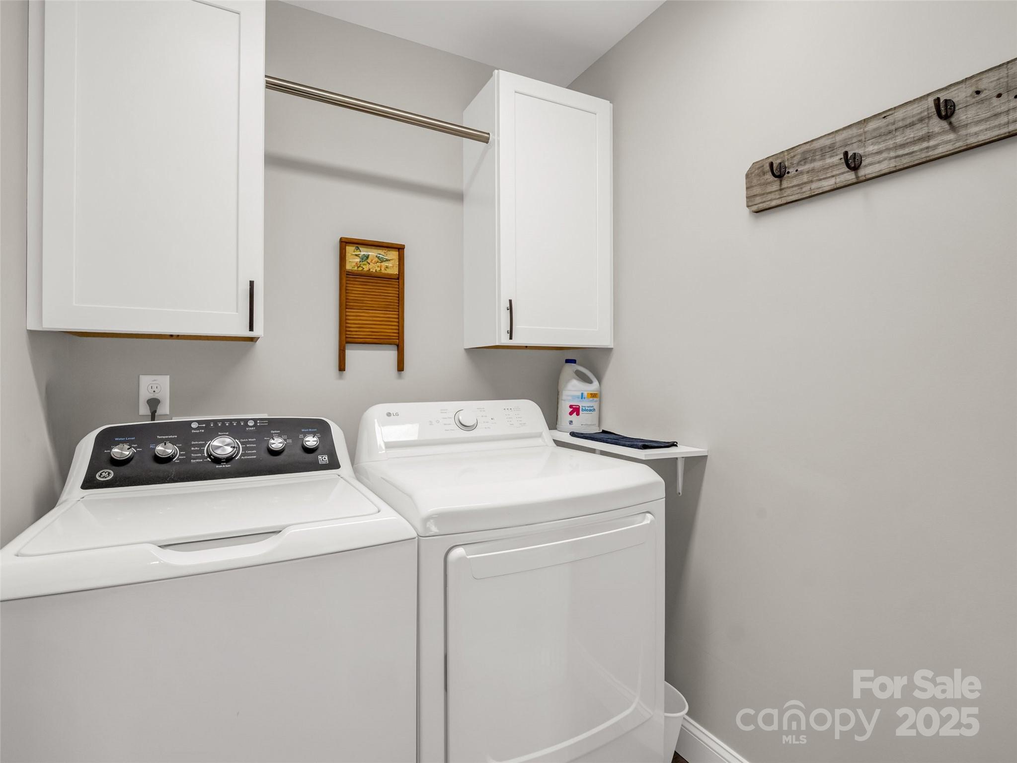 566 Blue Ridge Road Black Mountain, NC 28711 - Photo 28 of 41 a utility room with dryer and washer