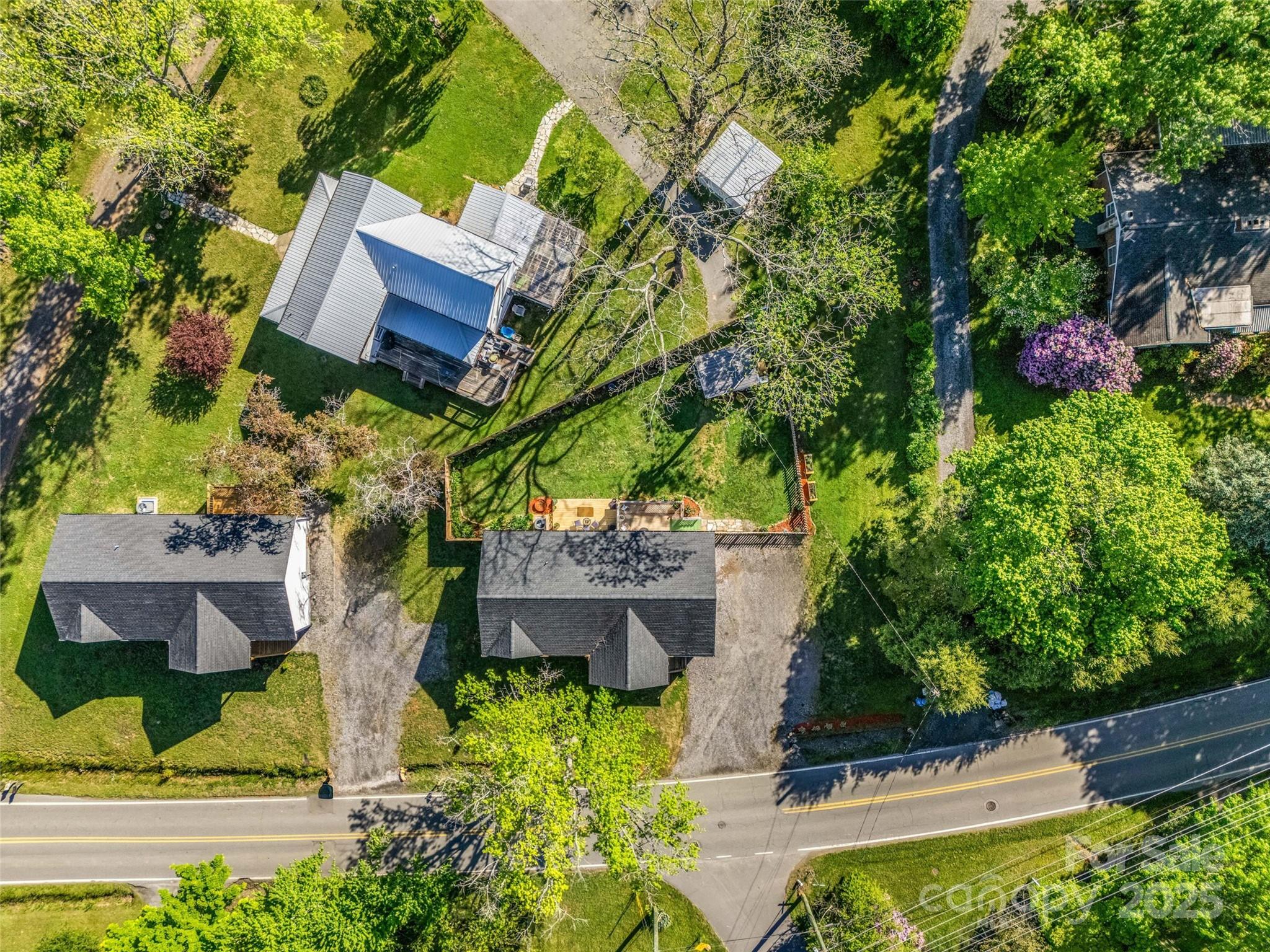 566 Blue Ridge Road Black Mountain, NC 28711 - Photo 39 of 41 an aerial view of a house with garden space and street view