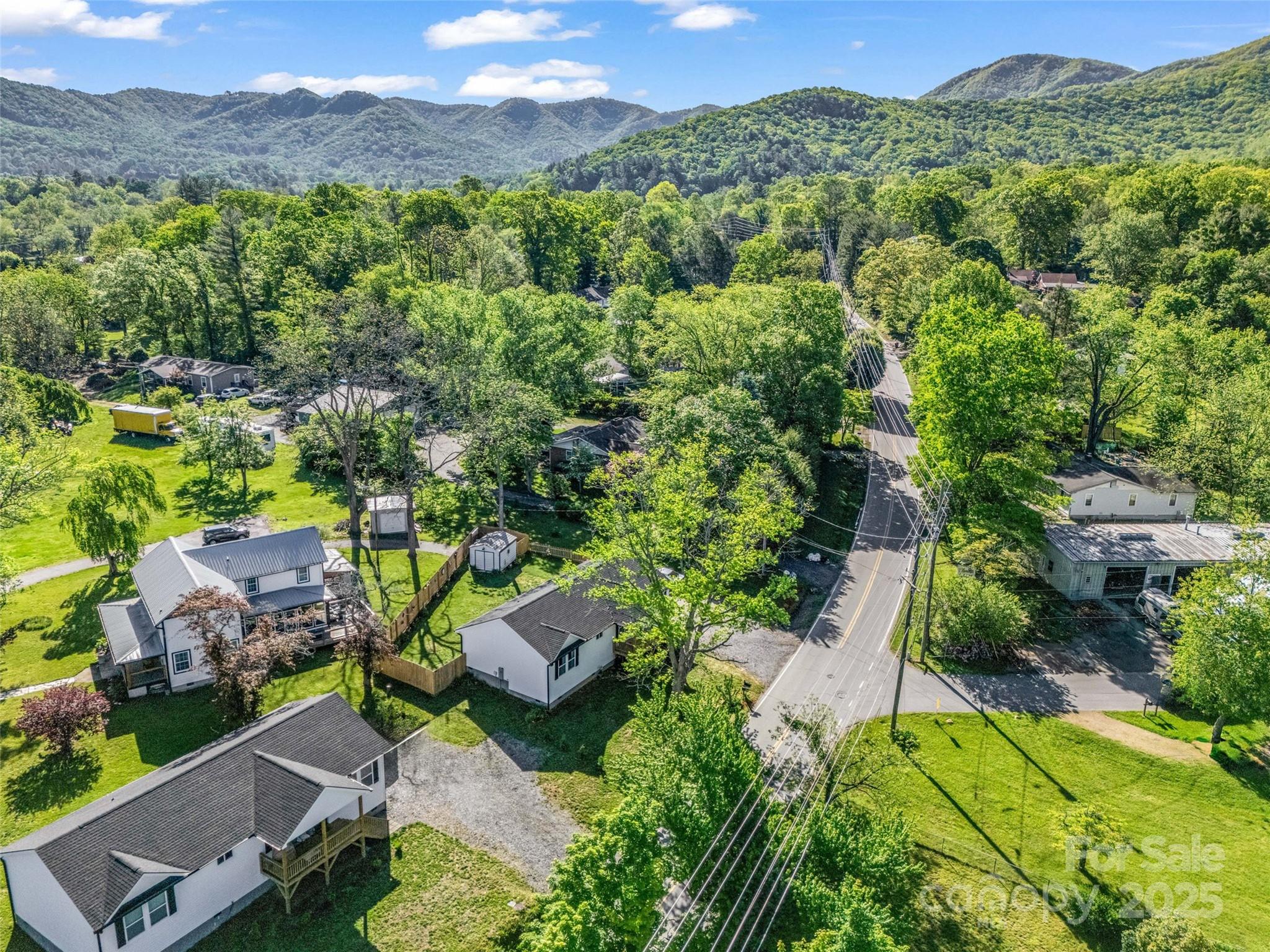 566 Blue Ridge Road Black Mountain, NC 28711 - Photo 41 of 41 an aerial view of multiple house