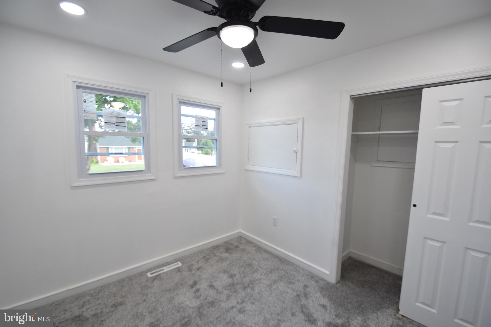 6 Russell Road New Castle, DE 19720 - Photo 11 of 16 a view of an empty room with a window