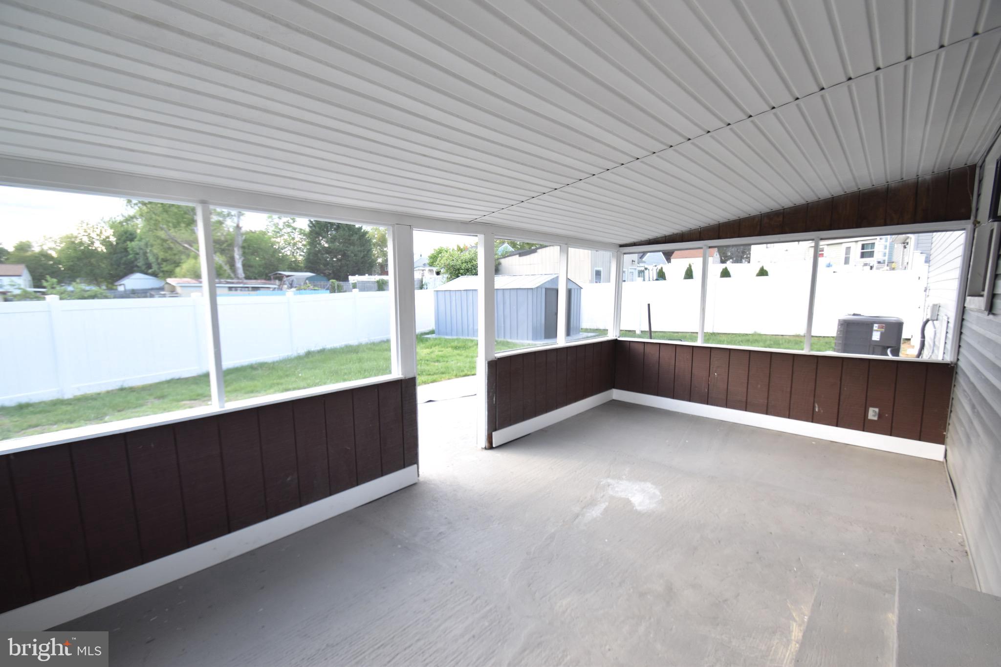 6 Russell Road New Castle, DE 19720 - Photo 15 of 16 a view of an empty room with a large window