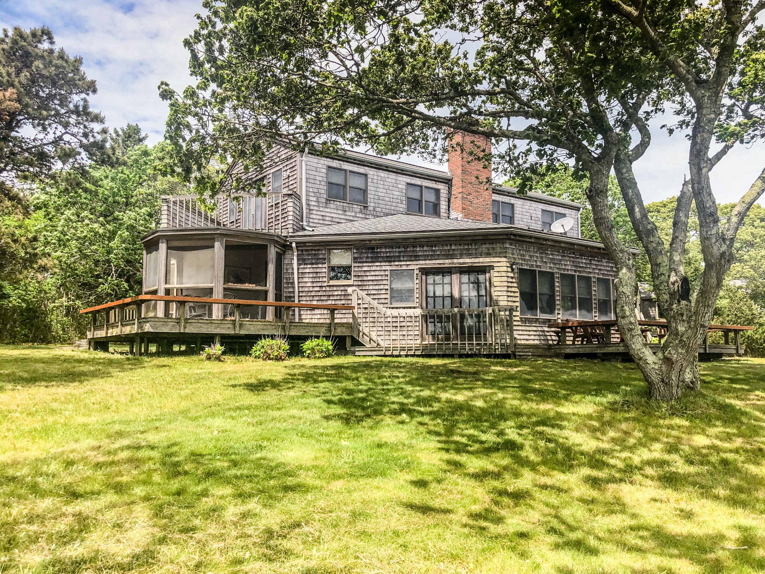 56 Green Pastures Road Edgartown, MA 02539 - Photo 1 of 35 a view of a house with swimming pool and sitting area