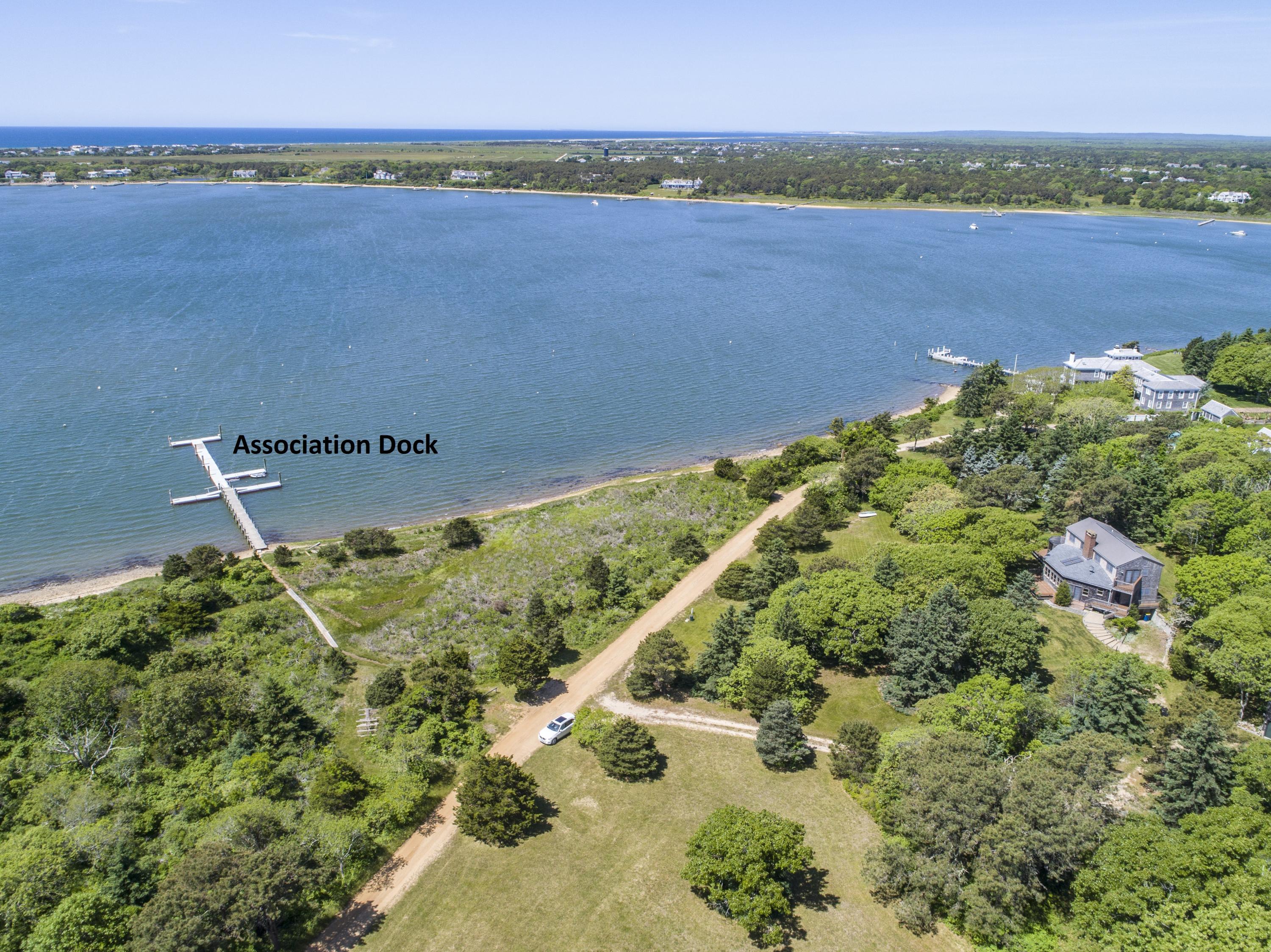 56 Green Pastures Road Edgartown, MA 02539 - Photo 8 of 35 a view of a lake with a mountain