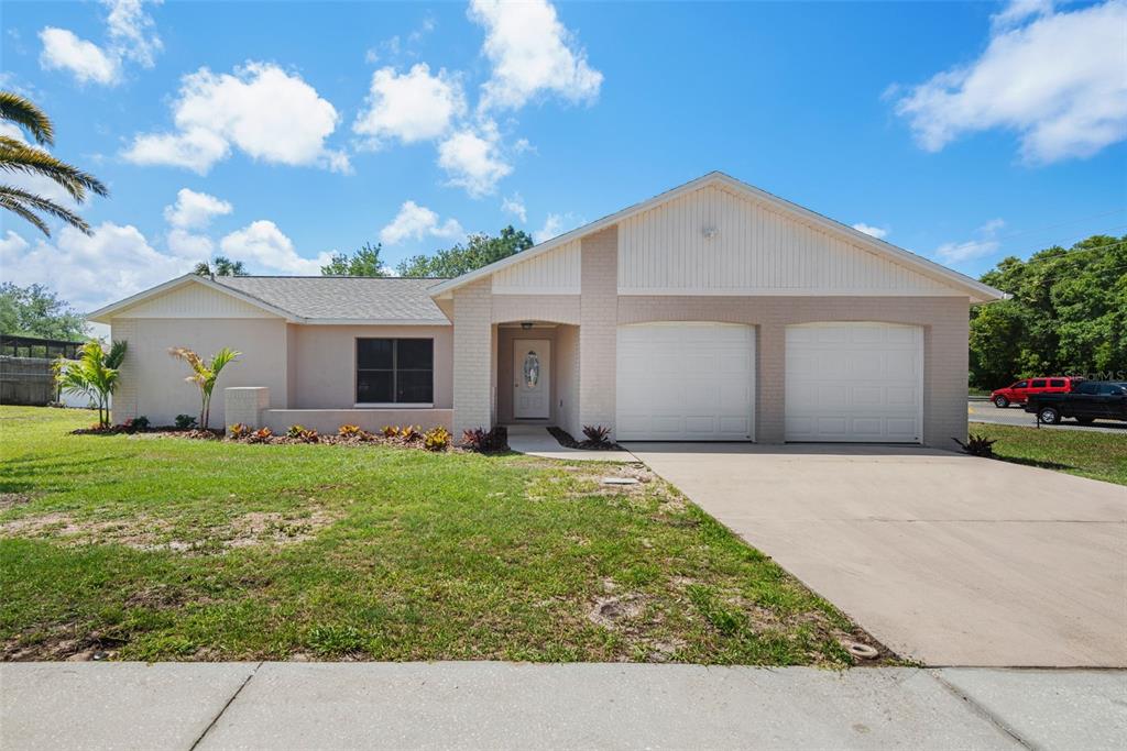 7012 Arbor View Lane New Port Richey, FL 34653 - Photo 1 of 1 a front view of house with yard