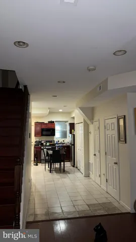 a view of living room and kitchen