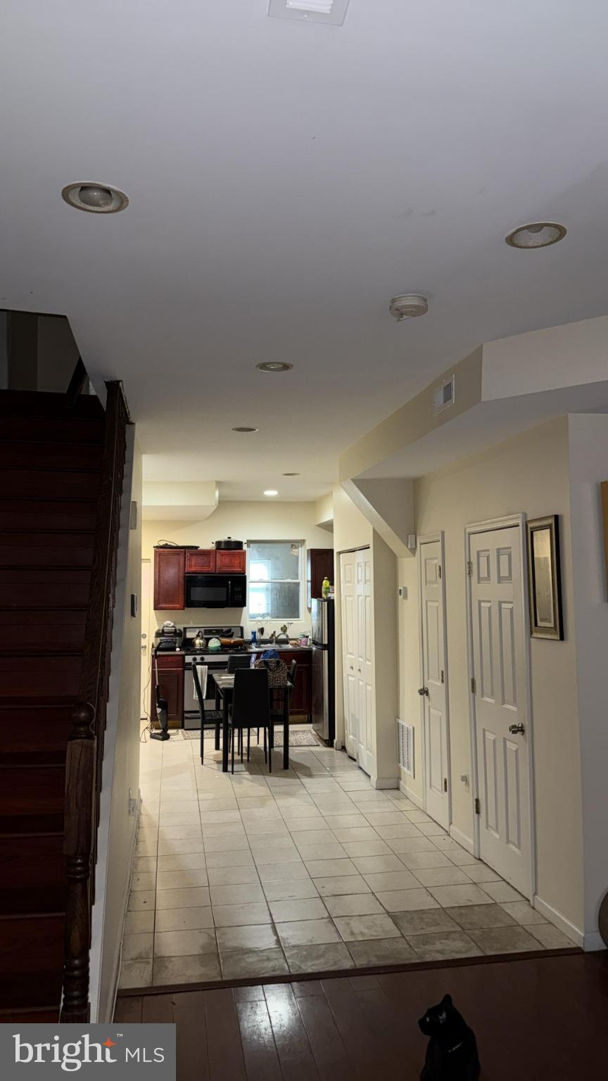 2586 West Fayette Street Baltimore, MD 21223 - Photo 12 of 17 a view of living room and kitchen