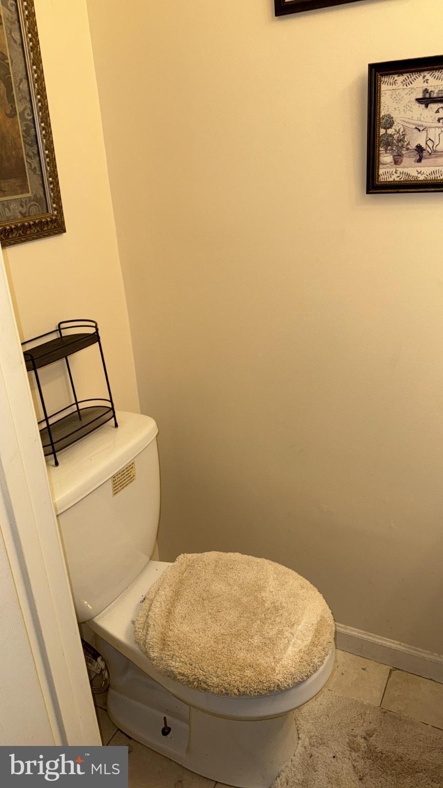 2586 West Fayette Street Baltimore, MD 21223 - Photo 10 of 17 a bathroom with a toilet and a sink