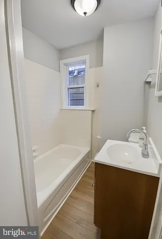 a bathroom with a sink and a bathtub