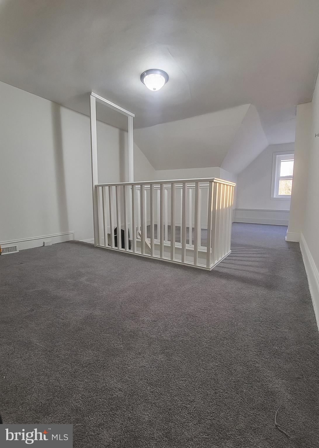 112 Old Rose Street Trenton, NJ 08618 - Photo 6 of 7 a view of an empty room with a window