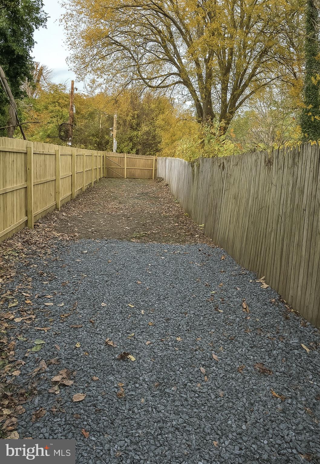 112 Old Rose Street Trenton, NJ 08618 - Photo 7 of 7 a view of backyard with wooden fence