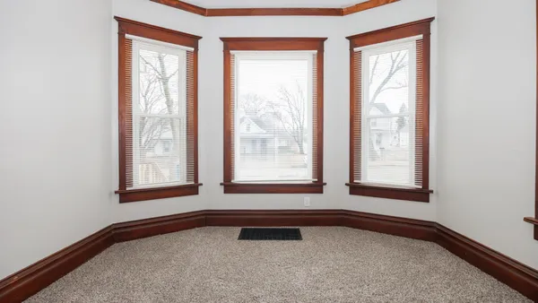 a view of a window in an empty room